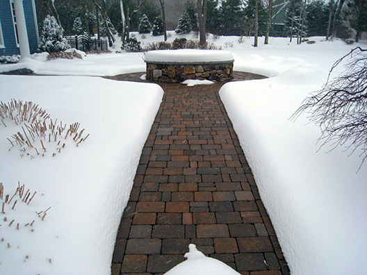 Installing a heated driveway in asphalt.