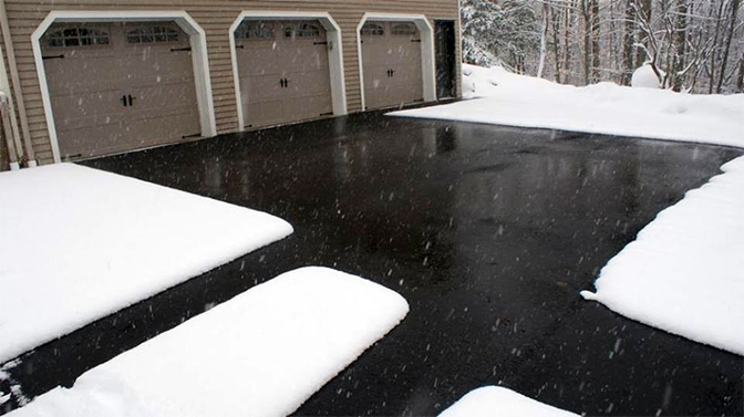 A custom heated driveway and walk ways in asphalt.