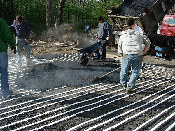 Installing a heated driveway in asphalt.