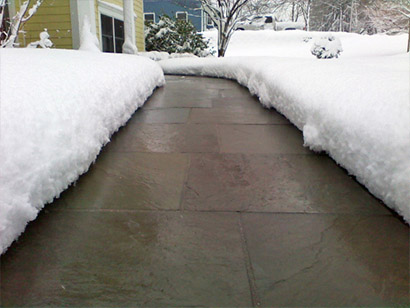 A heated walkway after a snowstorm.