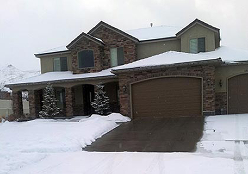 A radiant heated concrete driveway on an incline.